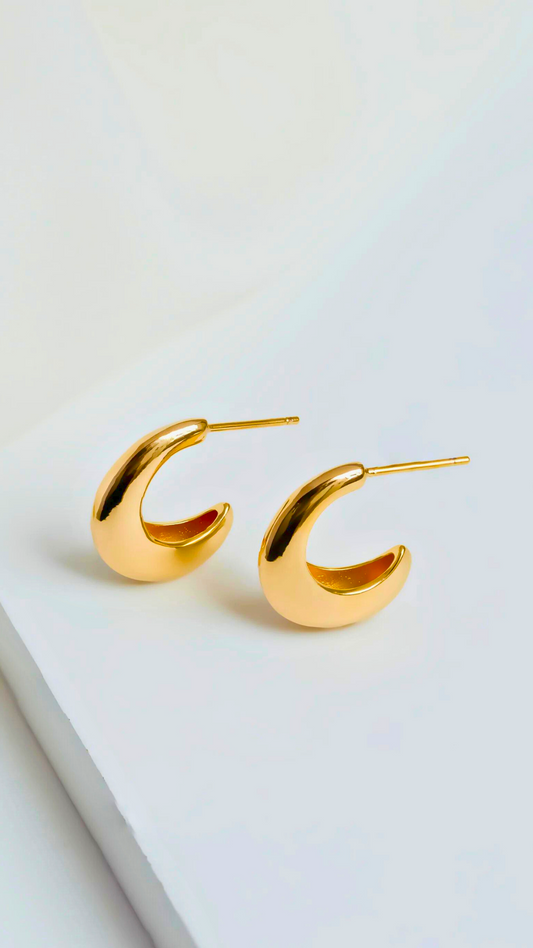 18k gold-plated Grazi half-hoop earrings with a classic design, adding a touch of elegant glamour suitable for any outfit.